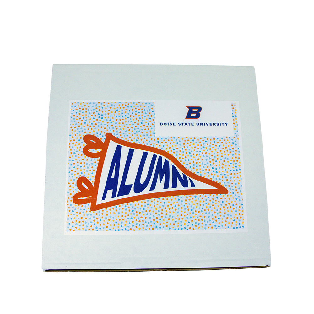 Closed Boise State Alumni gift box with alumni artwork on the lid.