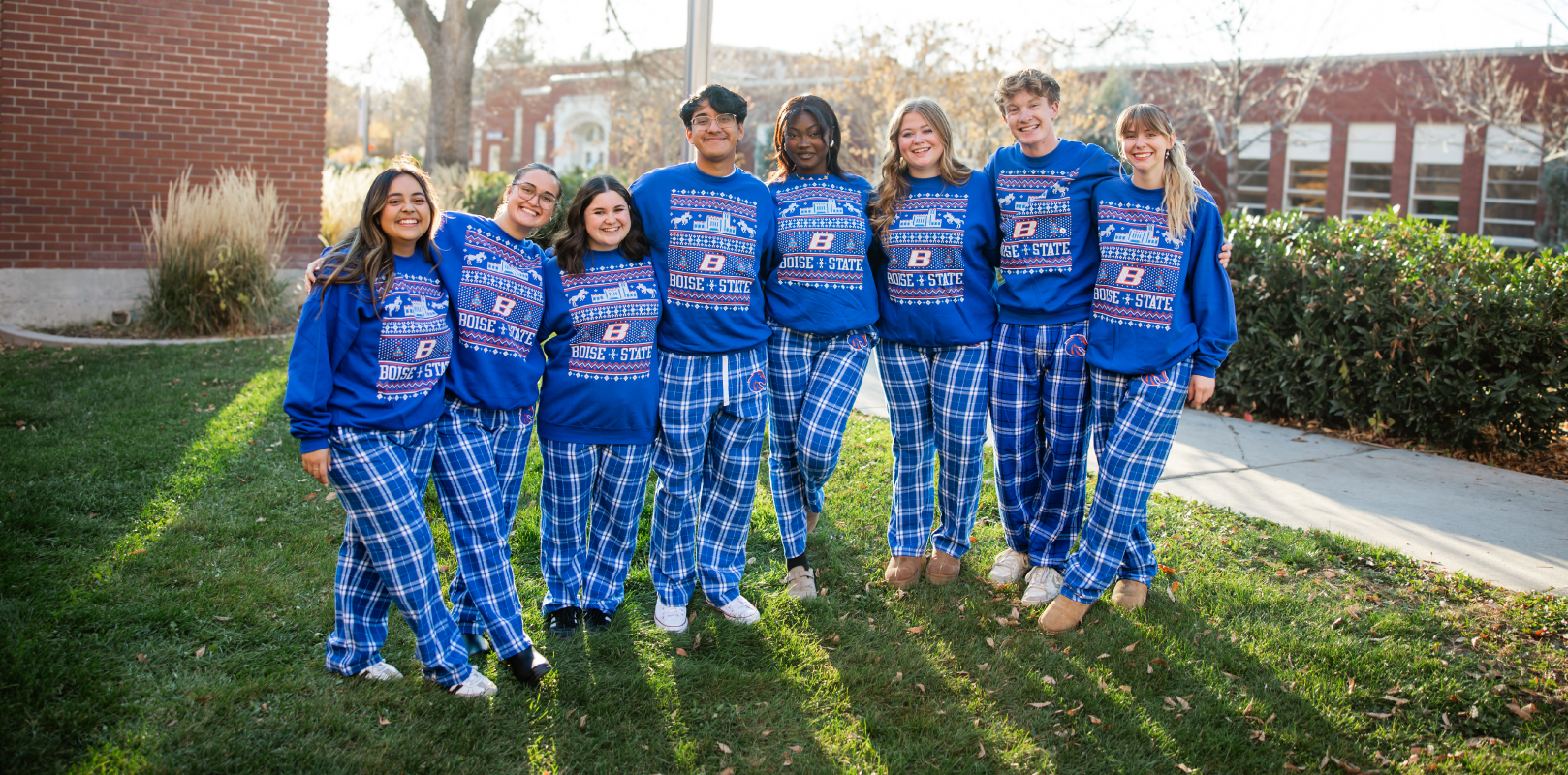 Large image showing 8 students in Boise State Holiday Gear to Celebrate the Sales!