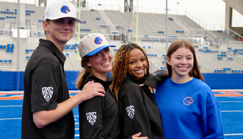 Boise State students wearing Broncos and Pac-12 apparel on The Blue