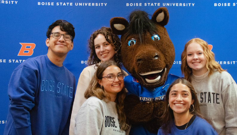 Slideshow image of students with Buster Bronco to celebrate student orientations!